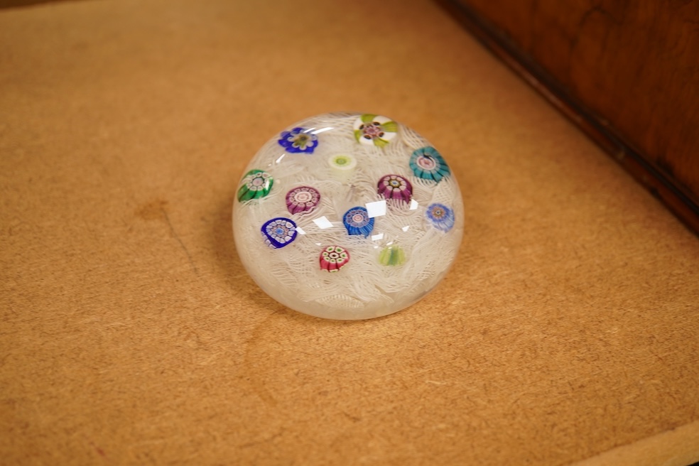 A Perthshire millefiori paperweight, 6.5cm in diameter, together with related Sotheby’s catalogues